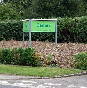 Cedars sign at Pease Pottage detention camp